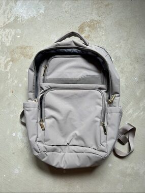 Open Story brand Laptop Backpack in Taupe